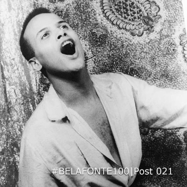 Harry Belafonte singing infront of old Jamaica image